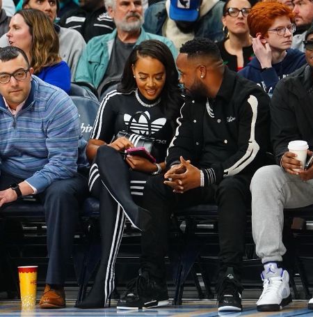 Yo Gotti and his new partner, Angela Renee Simmons, went to an NBA game in January.